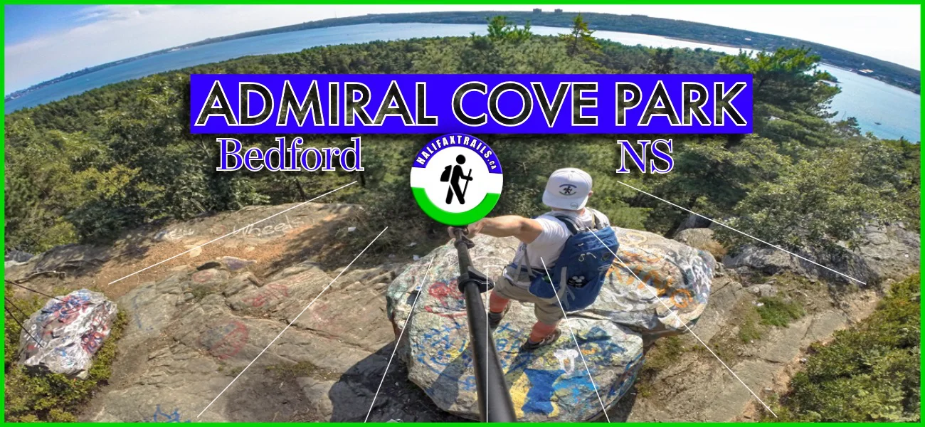 Title graphic for Admiral Cove Park in Bedford, Nova Scotia, featuring a wide-angle panoramic view from 'Eagle's Rock' lookout, showing a hiker on graffiti-painted granite boulders overlooking Bedford Basin and the lush forest below.