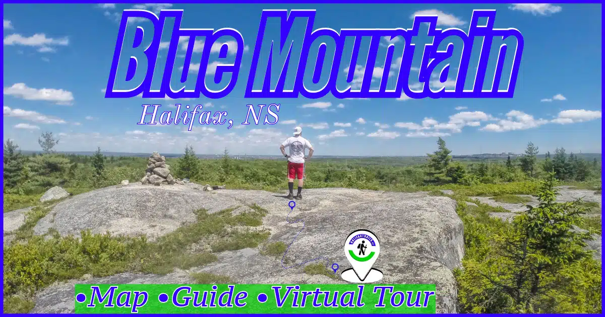 Granite barrens overlook at Blue Mountain Birch Cove Lakes Wilderness Area in Halifax, featuring a stone cairn and panoramic forest views.