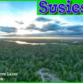 Aerial sunset view of Susies Lake and the lush forest canopy of the Blue Mountain-Birch Cove Lakes Wilderness Area in Halifax, Nova Scotia